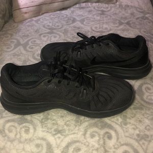 Black Nike running shoes